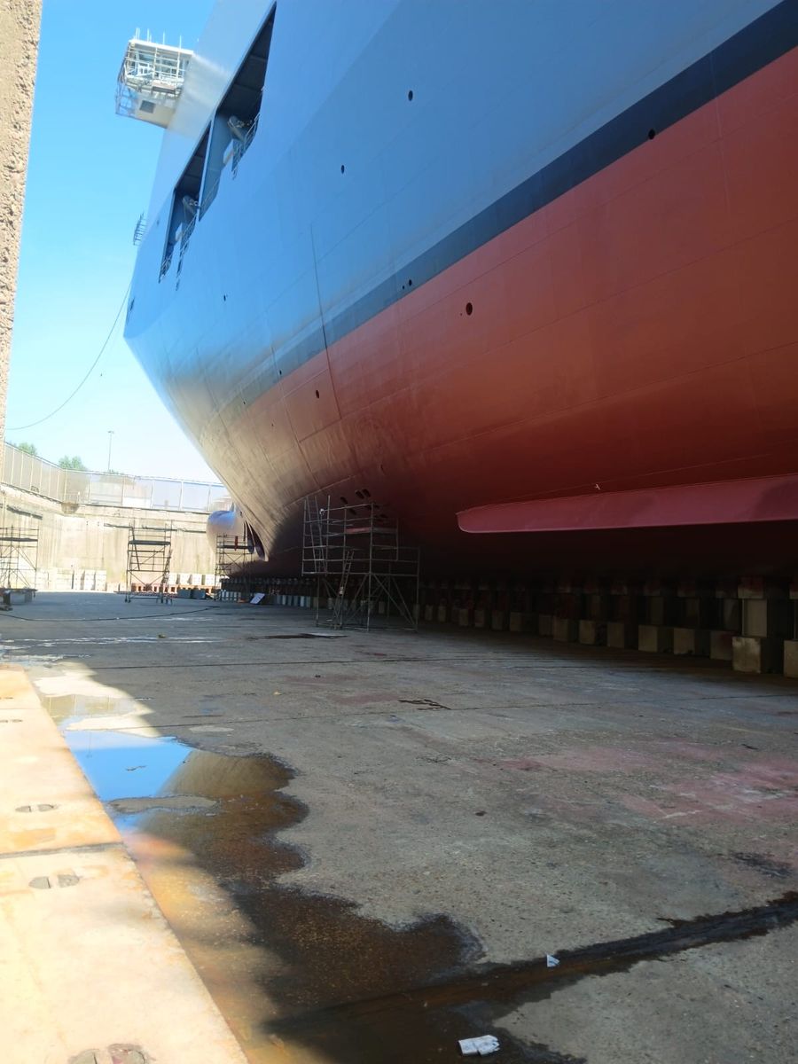 Hull side showing the finished antifouling, boot top and topside coating
